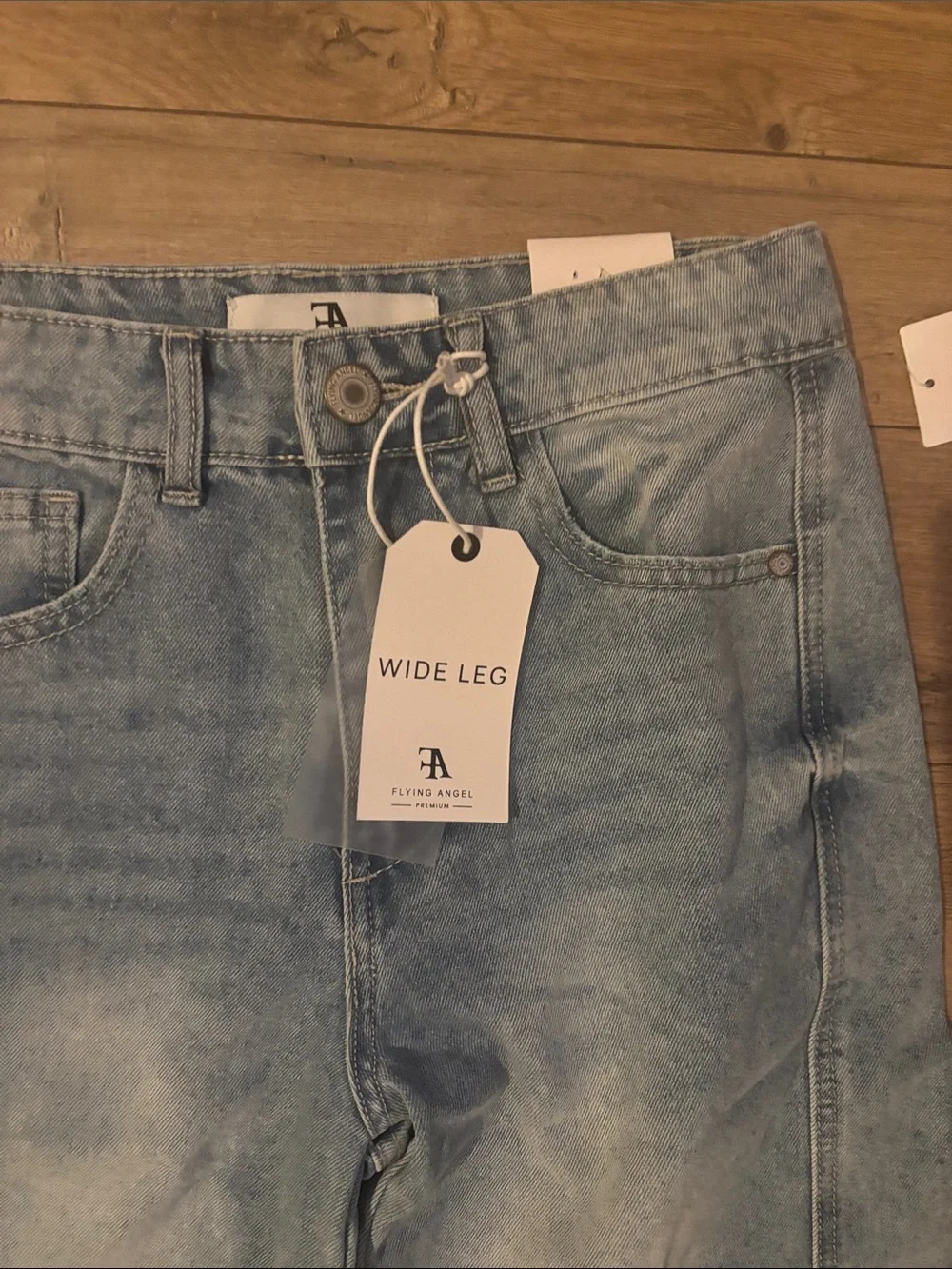 Flying Angel High-Rise Wide Leg Jeans in Light Blue